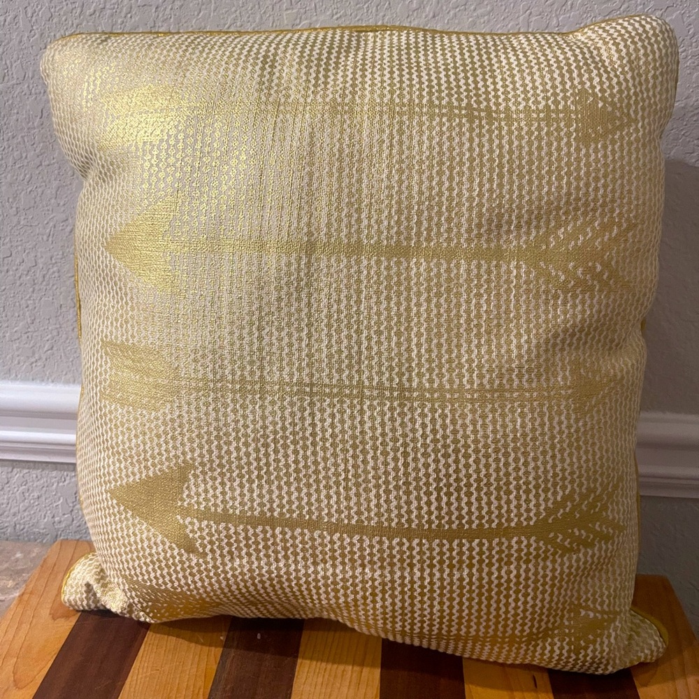 Gold arrow accent pillow